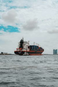 Ship in ocean carrying containers